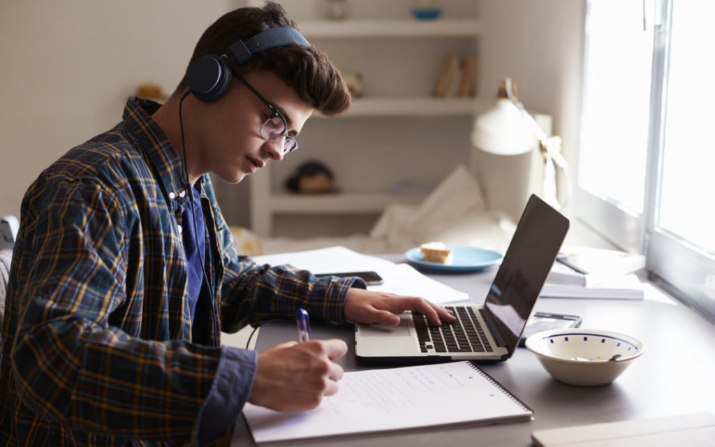 Teenage boy studying